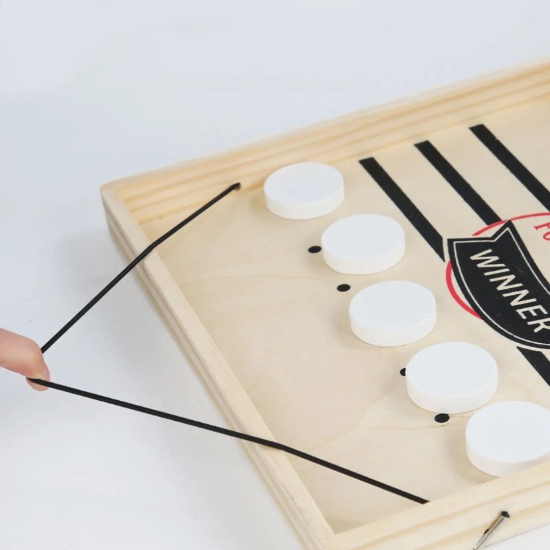 Le jeu qui connecte les familles - Family SlingPuck™